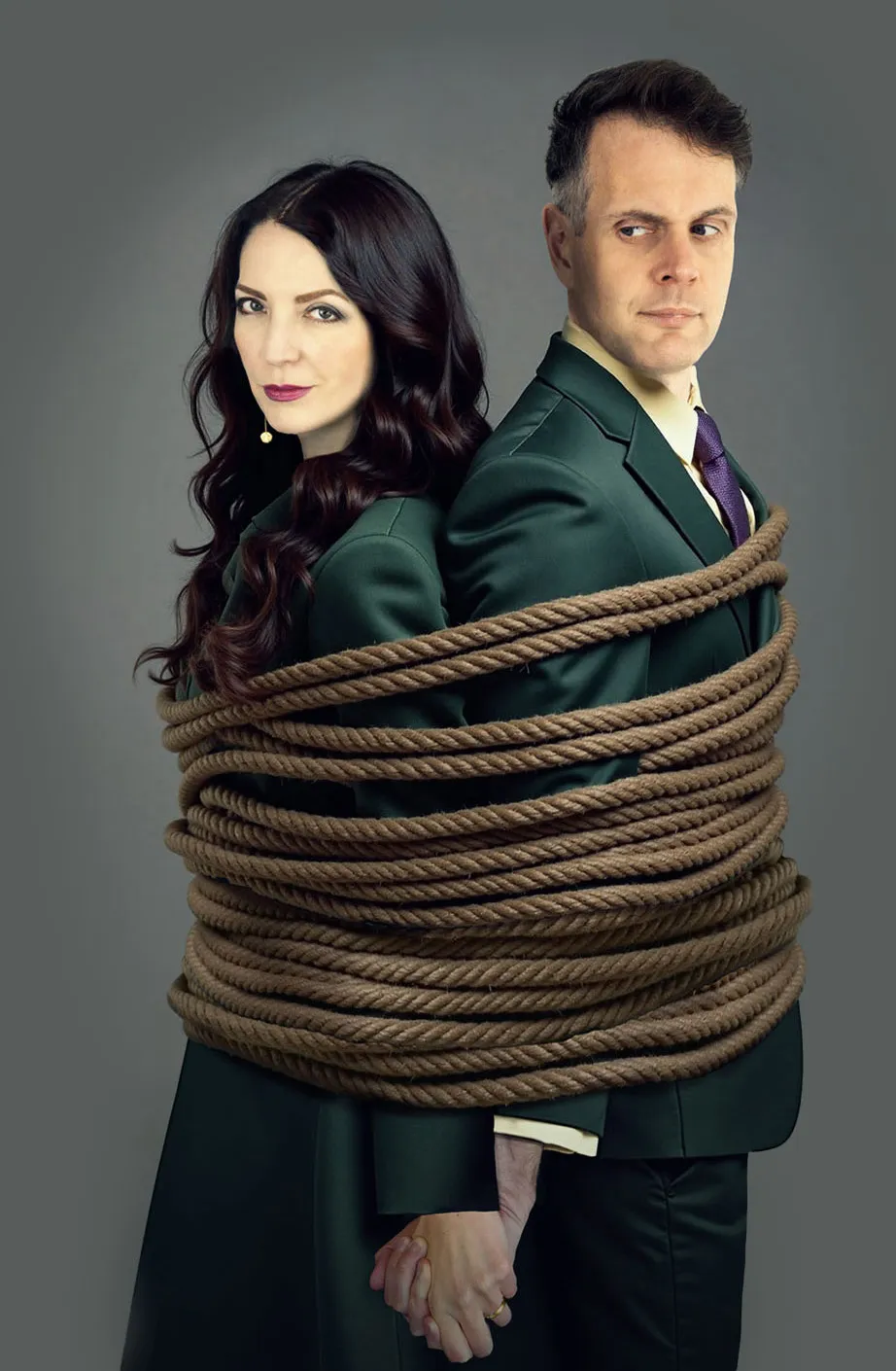 Lora and Barry are tied together with rope